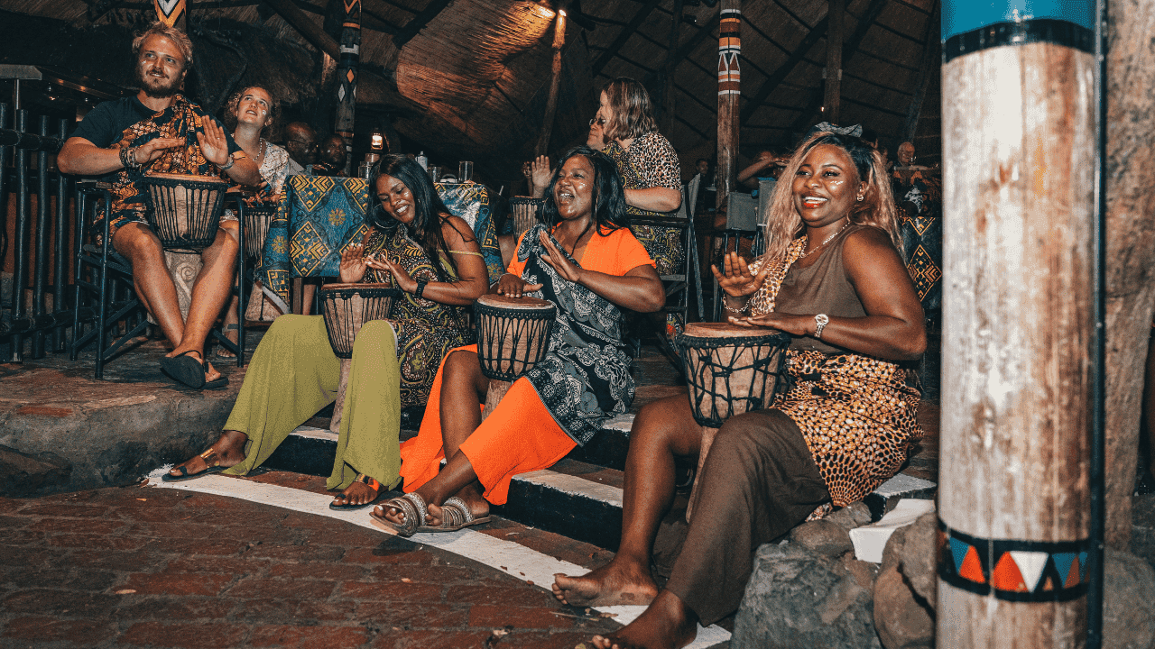 Guests drumming away